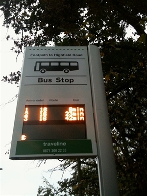 A picture of the live information bus stop flag, showing predicted arrival times