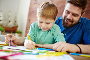 Man and child drawing