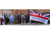 The Chair and Vice Chair raising the flag outside West Berkshire Council for Armed Forces Day.