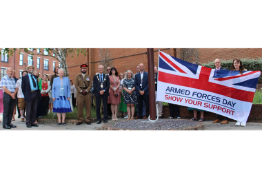 The Chair and Vice Chair raising the flag outside West Berkshire Council for Armed Forces Day.