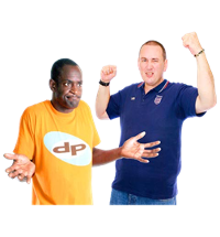 A person in a blue shirt with his arms raised