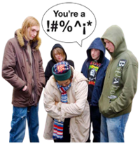 A group of people standing together with one person in the middle. One of the people is calling the person in the middle a nasty name.
