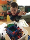 Playing with Lego at Swings and Smiles.